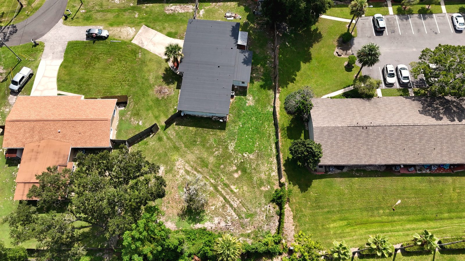 Yard and mature oak shade at 120 Kay Lane